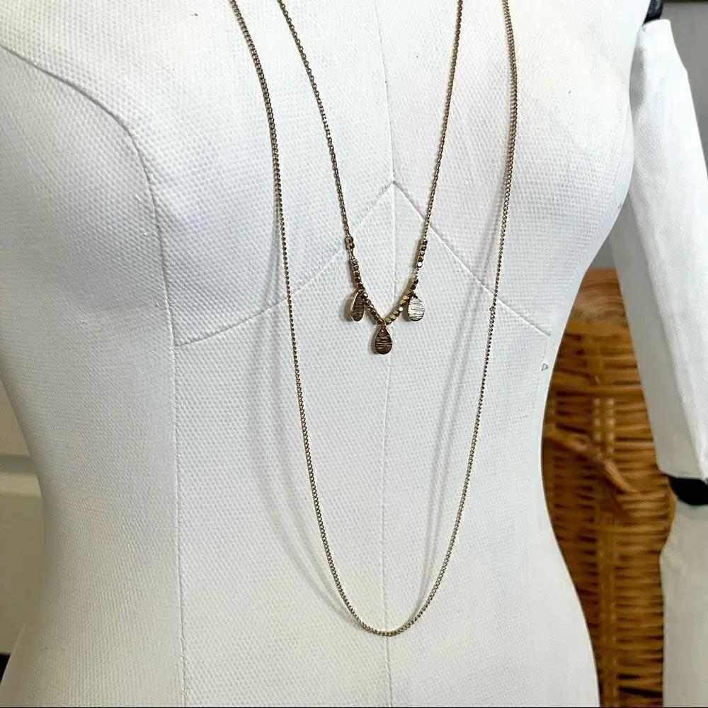 Gold colored two chain necklace